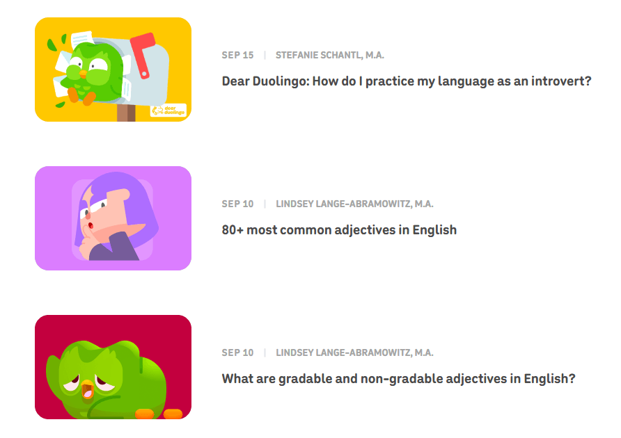 Duolingo content page showing playful article titles and expressive Duo character illustrations, including “Dear Duolingo: How do I practice my language as an introvert?”