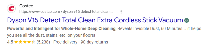 Google search result for a Costco Dyson V15 Detect vacuum showing a 4.5-star rating, 5,238 reviews, free delivery, and 90-day returns beneath the organic listing