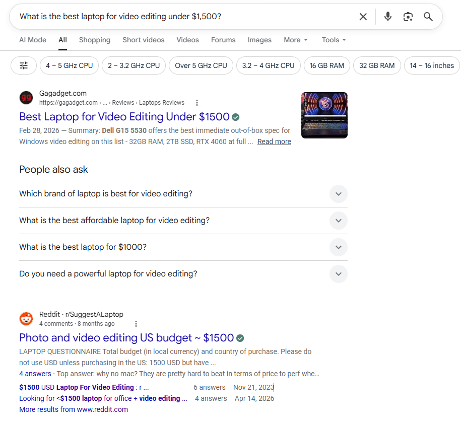 Google SERP for “best laptop for video editing under $1,500” showing reviews, People Also Ask, and Reddit discussions, demonstrating a network of related information needs rather than one isolated keyword